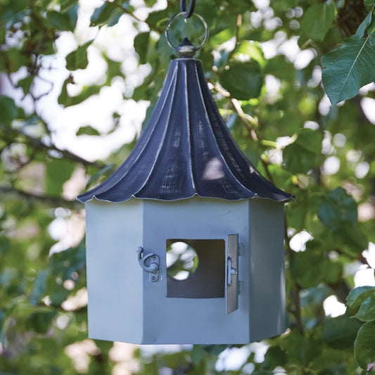 Queen Victoria-inspired birdhouse with a Victorian-shaped roof, gardenesque colors, and a sturdy metal loop for hanging.