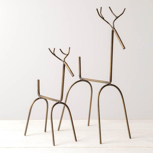 Two modern reindeer sculptures in antique brass, one large and one small, elegantly designed to enhance any decor.