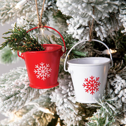 Red and white bucket ornaments in a box of six, featuring three vibrant red and three classic white buckets for decor.