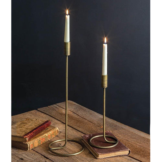 Elegant set of two taper candle holders with a charming design, perfect for enhancing any room's decor and style.