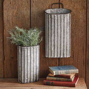 Two tall herringbone bins with elegant etching, perfect for floral displays. Nesting design for easy storage.