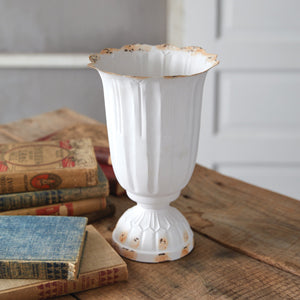 Large scalloped vase in soft white with rustic edges, perfect for French country decor, displayed on a wooden table.