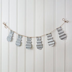 Corrugated metal bunny garland with jute rope, featuring ten cute bunnies, perfect for enhancing farmhouse Easter decor.