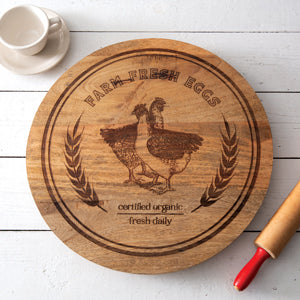 Rustic wooden lazy Susan with "Farm Fresh Eggs" text and two chickens, perfect for adding charm and functionality to your table.