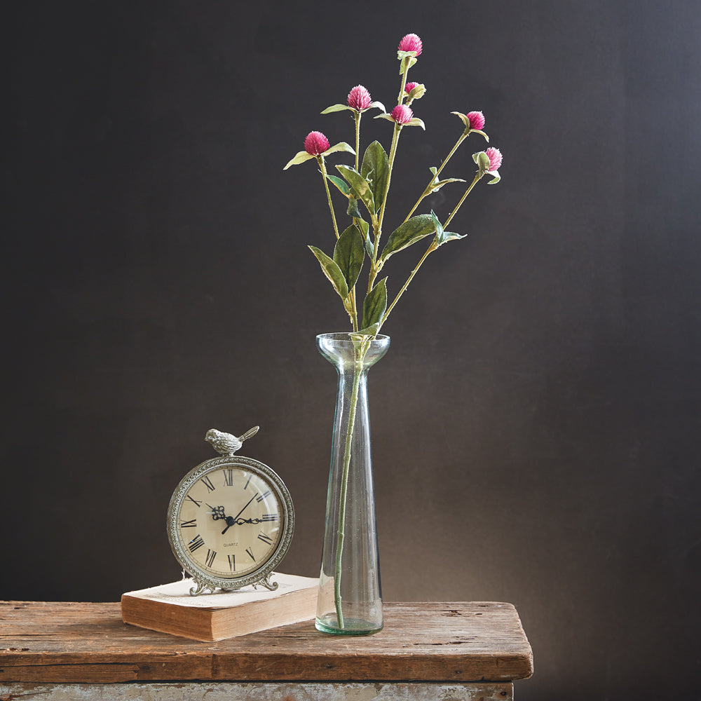 A pair of elegant trumpet vases made from recycled glass, showcasing a unique mouth-blown and seeded design, perfect for flowers.